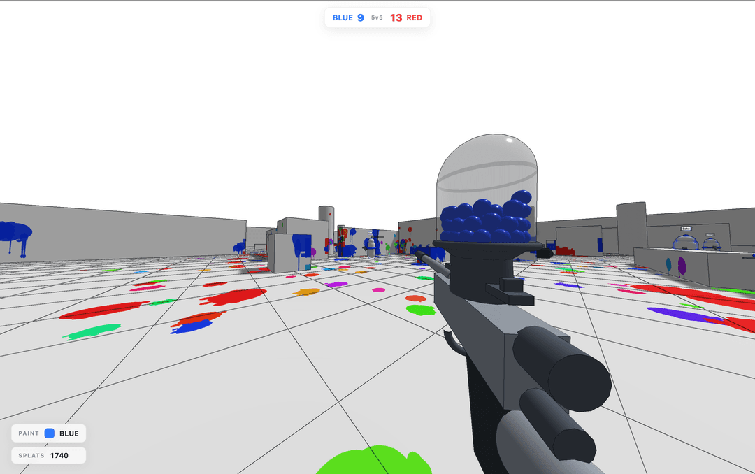 First-person view across a white grid arena floor covered in red, green, blue, and purple paint splatters